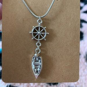 boat and steering wheel necklace